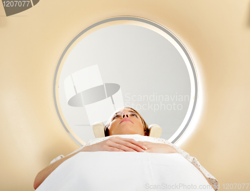 Image of Woman taking CT Scan