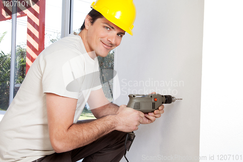 Image of Portrait of smiling man worker