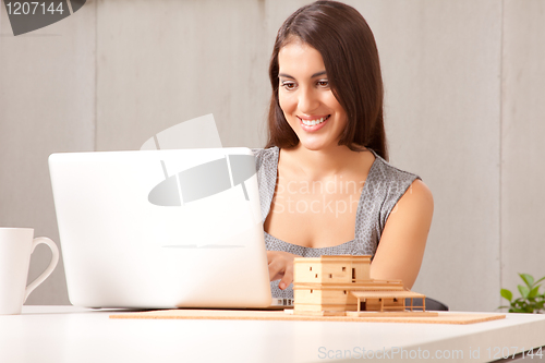 Image of Creative Woman at Desk