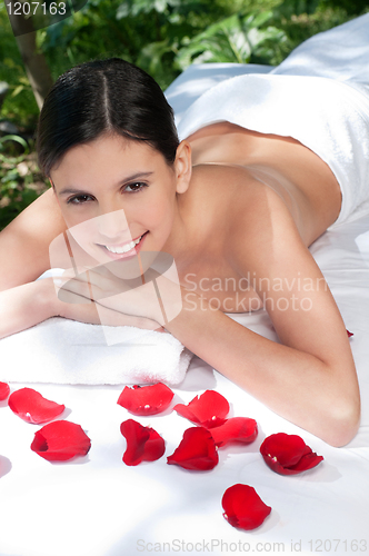 Image of Beautiful young woman relaxing