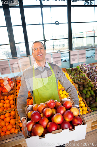 Image of Supermarket Owner with Fresh Produce