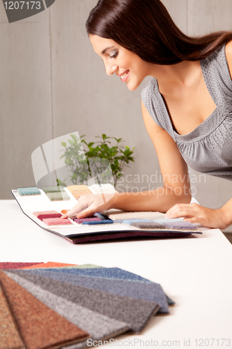 Image of Designer with Carpet Samples