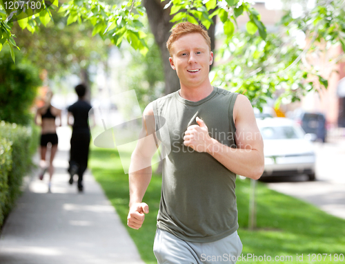 Image of People running on walkway