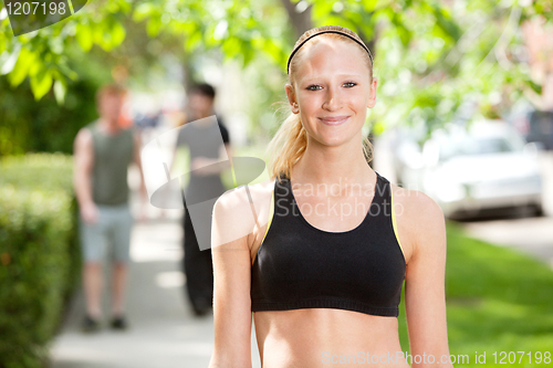 Image of Close-up of a woman in park