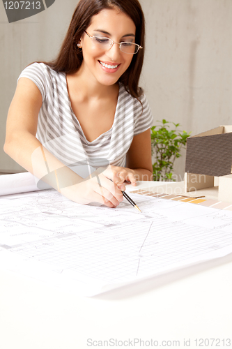 Image of Female Architect with Blueprints