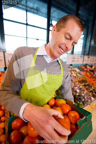 Image of Happy Grocery Store Owner