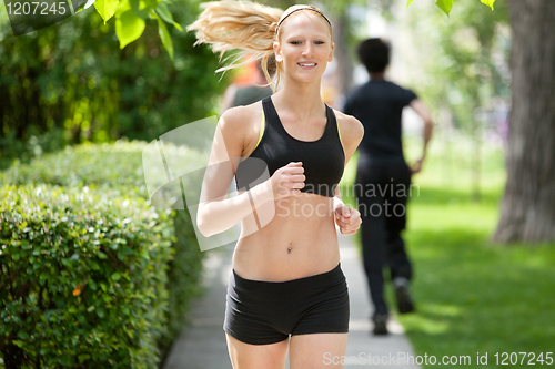Image of Portrait of a woman jogging