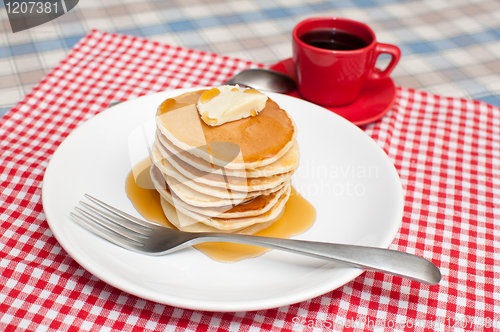 Image of Pancakes With Butter and Maple Syrup