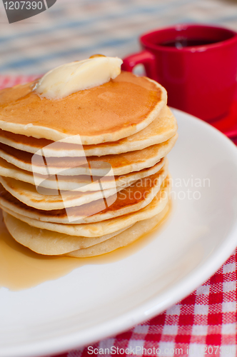 Image of Pancakes With Butter and Maple Syrup