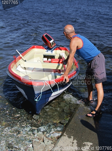 Image of Man with boat