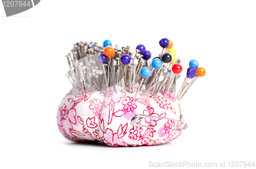 Image of Colored pinheads in pin-cushion