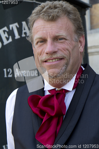 Image of Portrait of a man with a bow tie.