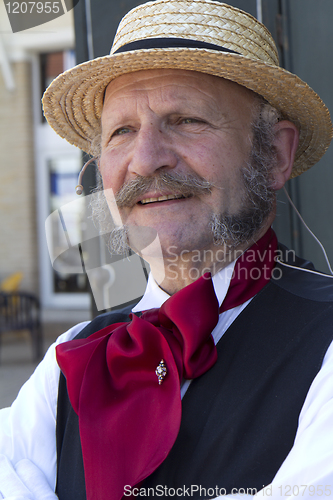 Image of Man with a straw hat
