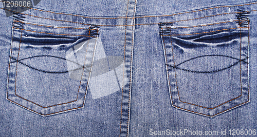 Image of Blue jeans fabric with pockets 