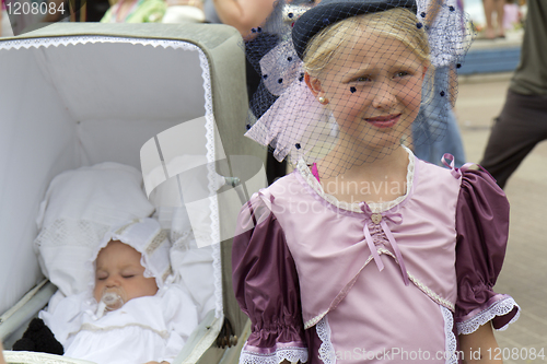 Image of A girl and a baby