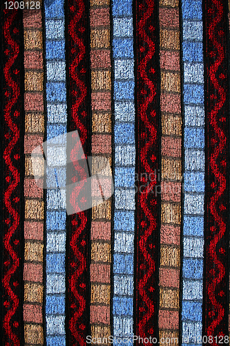 Image of Red, brown and blue knitted textured as background 