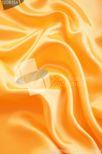 Image of Smooth elegant golden silk as background 