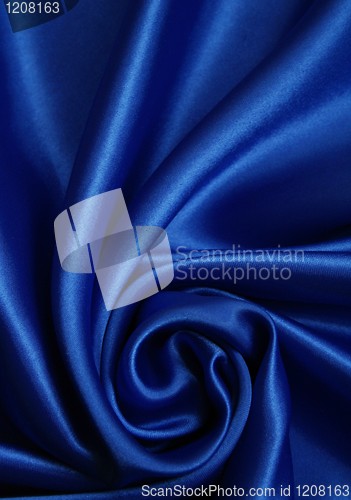 Image of Smooth elegant dark blue silk as background 