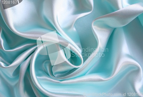 Image of Smooth elegant blue silk as background 