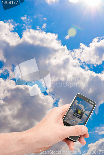 Image of Smartphone in Hand - Weather Forecast