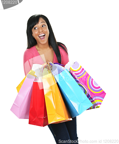 Image of Excited young black woman with shopping bags