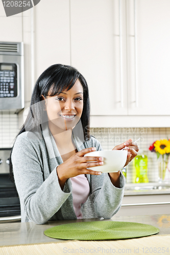 Image of Woman having breakfast