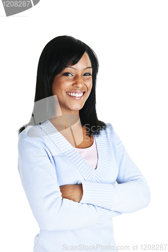 Image of Smiling young woman with crossed arms
