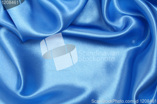 Image of Smooth elegant blue silk as background 