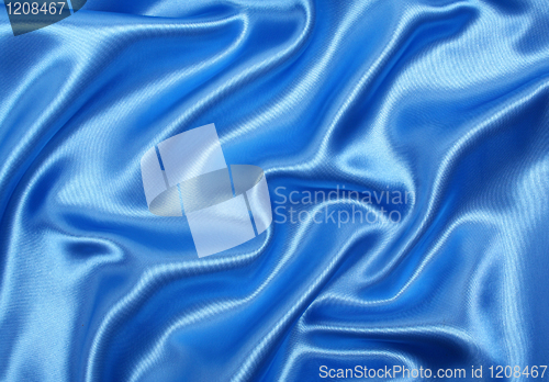 Image of Smooth elegant blue silk as background 