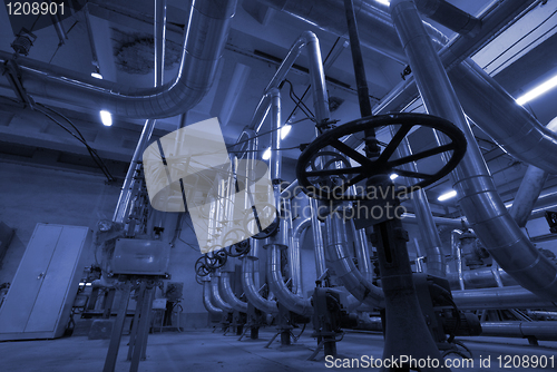 Image of Industrial zone, Steel pipelines in blue tones  