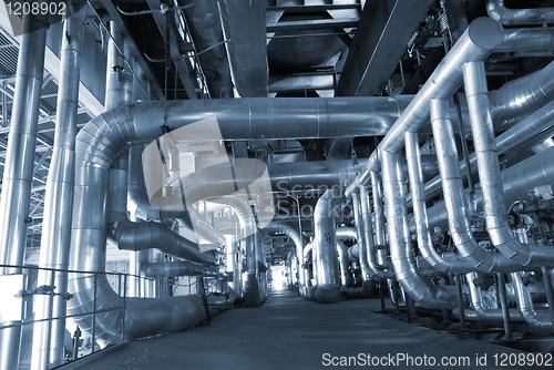 Image of Industrial zone, Steel pipelines in blue tones  