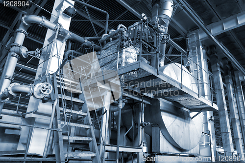 Image of Industrial zone, Steel pipelines in blue tones  