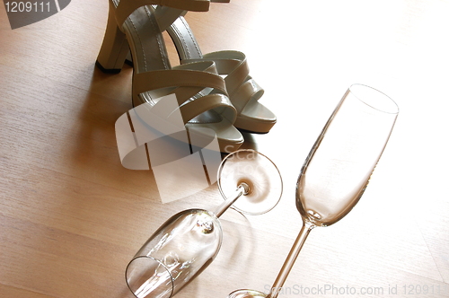 Image of sexy high heel and champagne glass