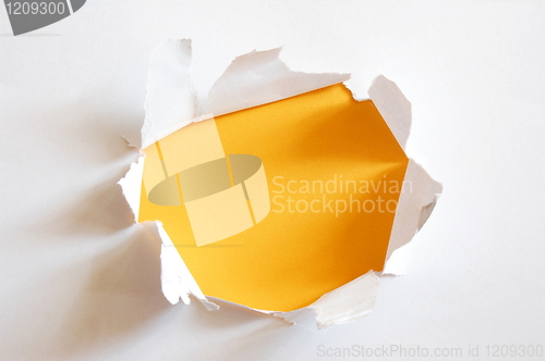 Image of yellow hole in paper