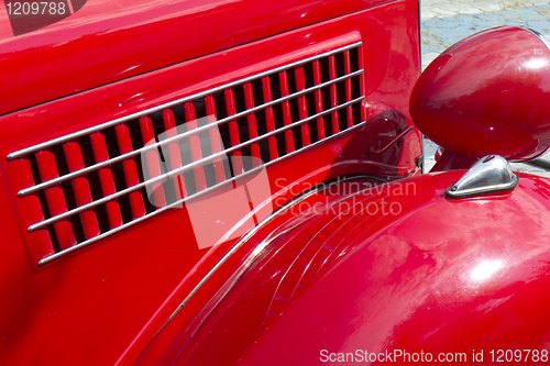 Image of Vintage automobile vent detail .