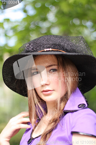 Image of Girl in violet and black