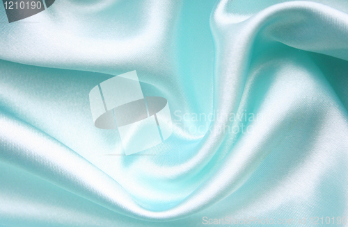 Image of Smooth elegant blue silk as background