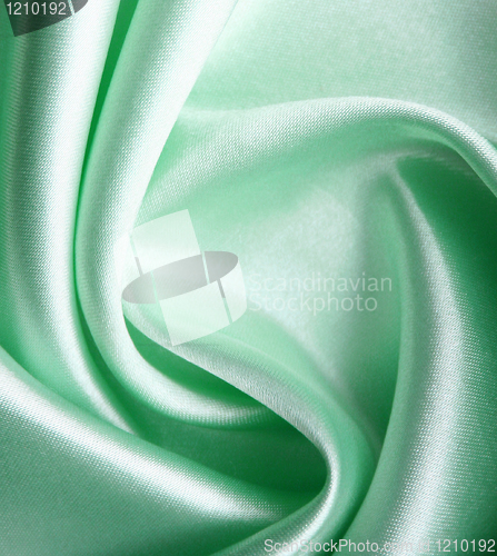 Image of Smooth elegant green silk as background