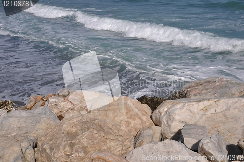 Image of Ocean waves from stone pier