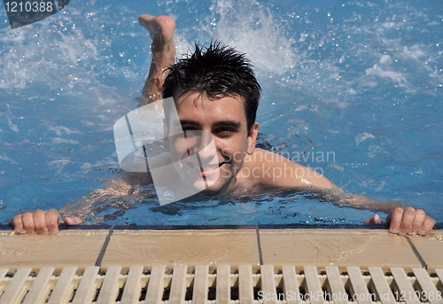 Image of Man in water gymnastics