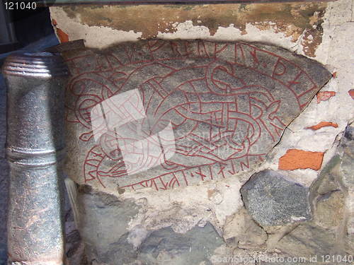 Image of Rune stone on a wall in the old town, Stockholm, Sweden