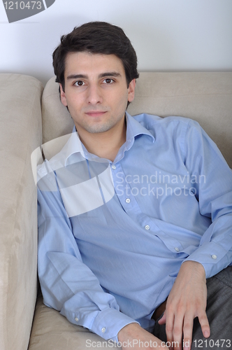 Image of Man relaxing on the couch