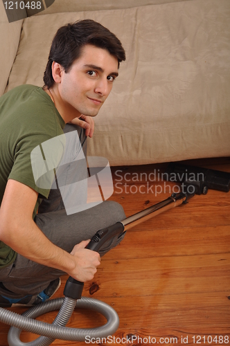 Image of Man doing the housework