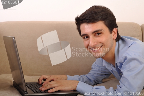 Image of Man surfing the web