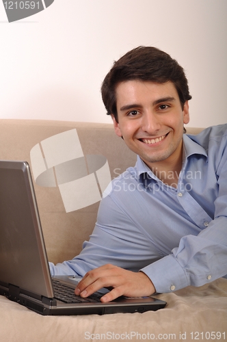 Image of Man surfing the web