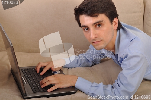 Image of Man surfing the web