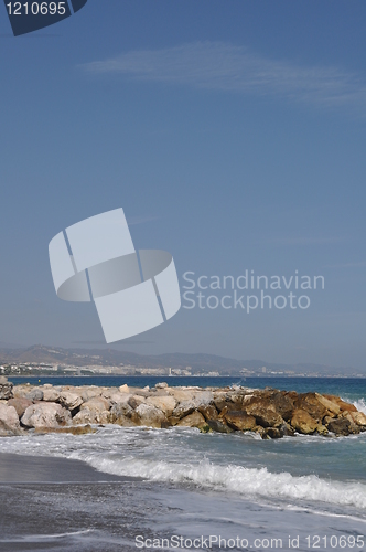 Image of Puerto Banus beach and stone pier