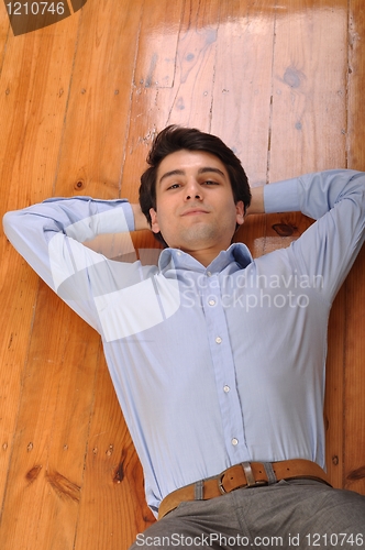 Image of Man lying on the floor