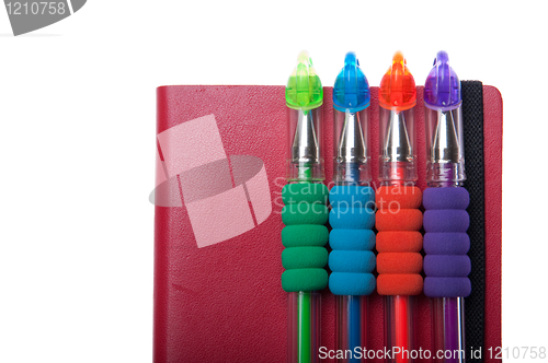 Image of Notebook and pens