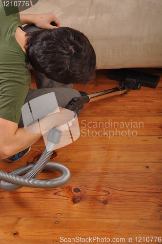 Image of Man doing the housework